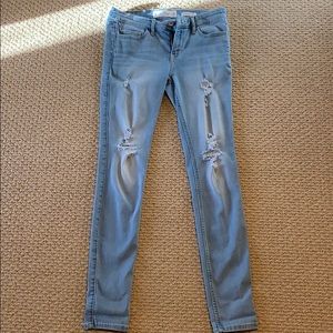 Ripped blue skinny jeans